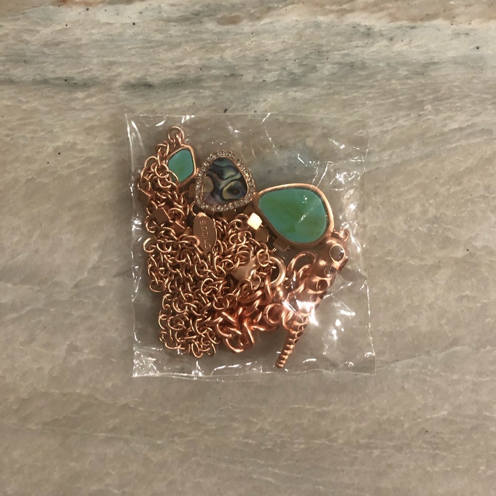 Rose gold necklace with teal stone